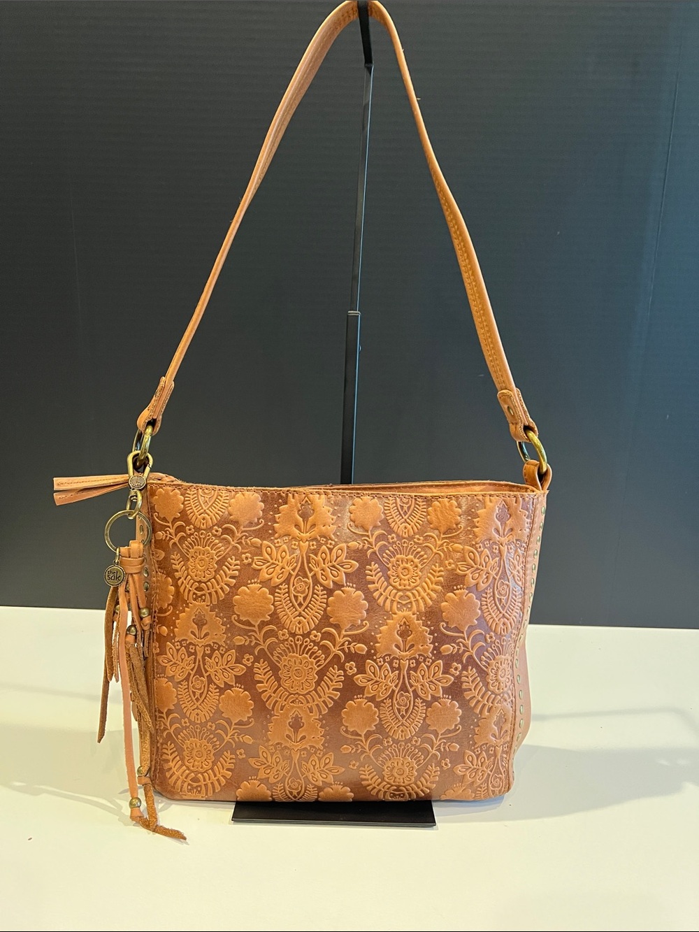 The Sak Tan Embossed Leather Shoulder Bag with Tassel